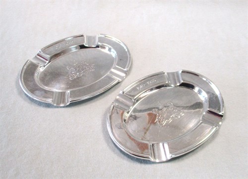 Lot 110 - A pair of Edward VII silver ashtrays