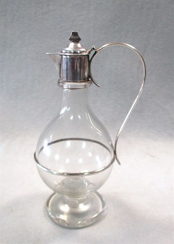 Lot 112 - A Victorian silver mounted glass flagon