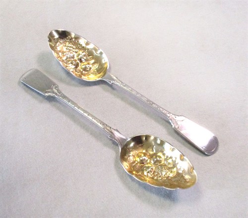 Lot 113 - A pair of George III table spoons with later decoration
