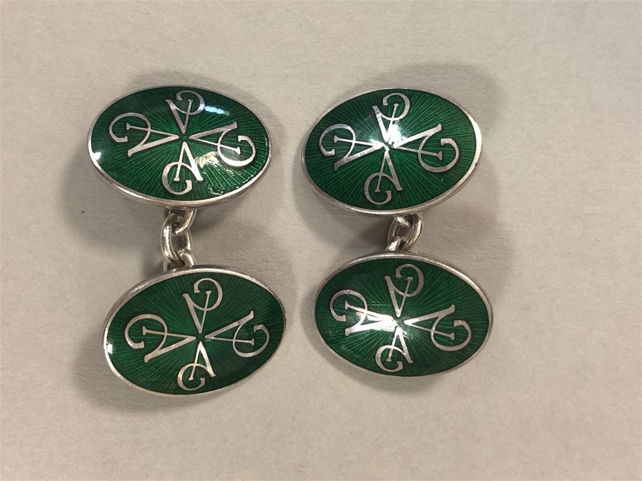 Lot 360 - A pair of Sterling silver and guilloché enamel cufflinks by Asprey & Garrard