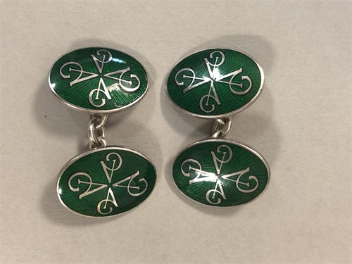 Lot 360 - A pair of Sterling silver and guilloché enamel cufflinks by Asprey & Garrard