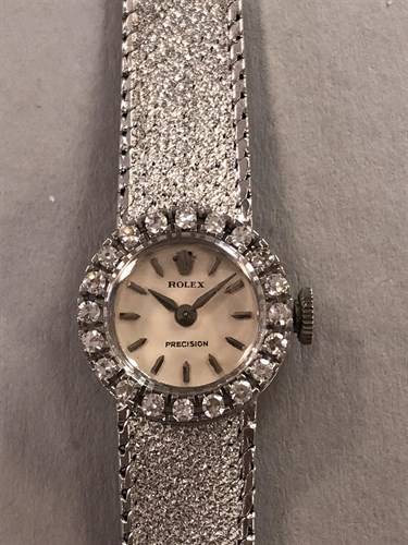 Lot 157 - Rolex - A lady's 18ct gold precision dress watch