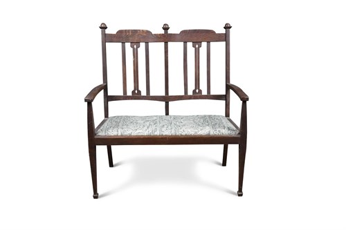 Lot 207 - An Arts & Crafts oak settee