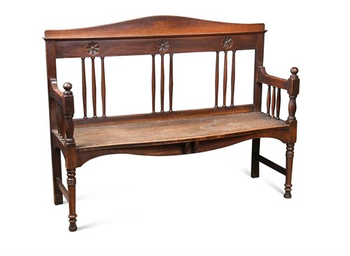 Lot 208 - Attributed to Shapland & Petter, an Arts & Crafts oak settle
