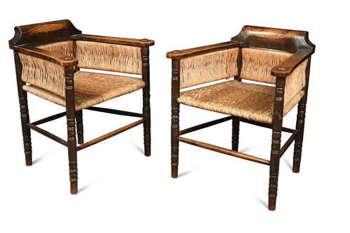 Lot 210 - A unusual pair of Arts & Crafts rush seated chairs, possibly Dutch or German