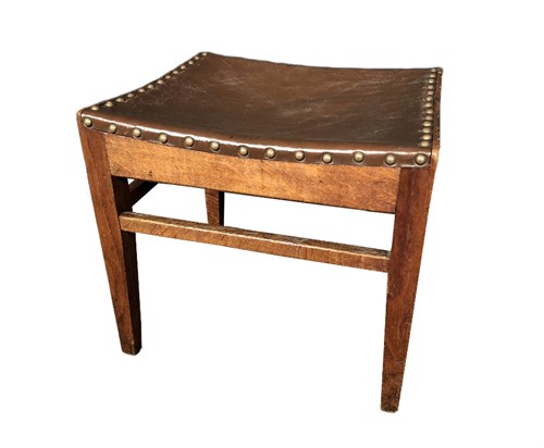 Lot 221 - Attributed to Arthur Simpson of Kendal (British, 1857-1922), an Arts & Crafts oak stool, circa 1910