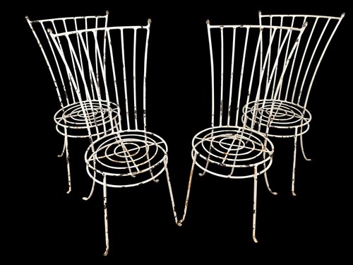 Lot 288 - A set of four white painted garden chairs, possibly Italian