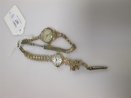 Lot 167 - Two 9ct gold lady's watches, one on a gold...