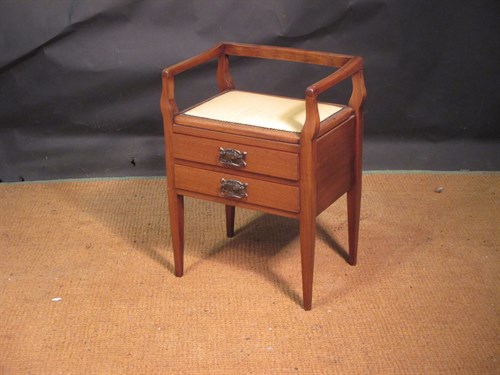 Lot 408 - An Edwardian mahogany piano stool with drawers...