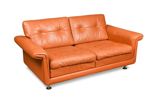 Lot 284 - A 1970's Danish two-seater leather sofa