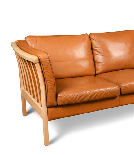 Lot 258 - Stouby, a Danish cognac leather two-seater sofa