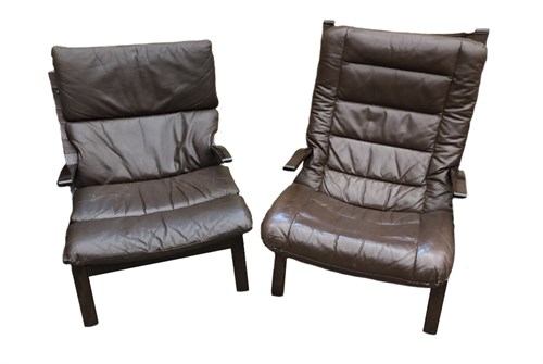 Lot 261 - A near pair of Fastrup formed laminate leather upholstered lounge chairs