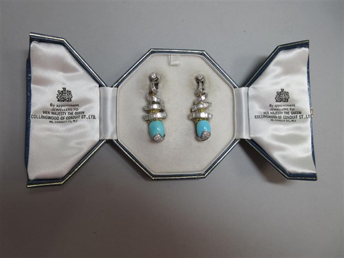 Lot 327 - A pair of diamond and turquoise earpendants retailed by Collingwood
