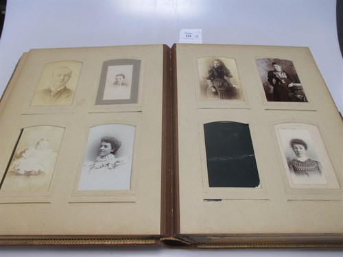 Lot 129 - Two late Victorian leather photograph albums...