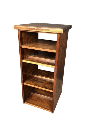 Lot 233 - An Art Deco walnut revolving bookcase