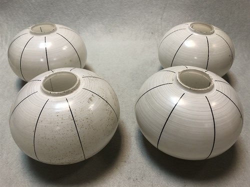 Lot 181 - A set of four Art Deco hand-painted glass light shades