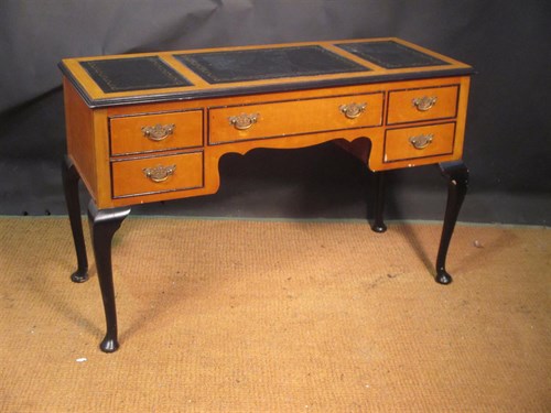 Lot 357 - A Continental satinwood writing desk, with...