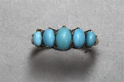 Lot 324 - An Edwardian turquoise five stone ring