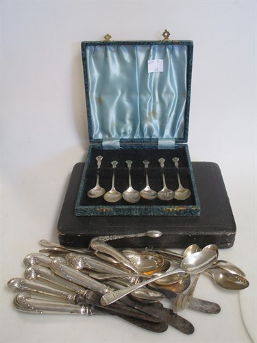 Lot 215 - Six dessert knives with loaded silver handles...