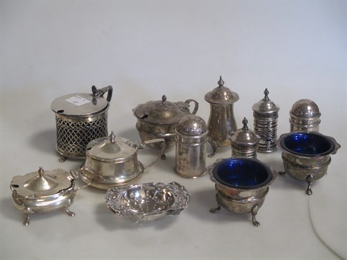 Lot 212 - A collection of silver condiments including a...