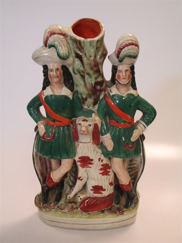 Lot 31 - A collection of Staffordshire figurines to...