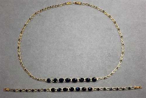 Lot 255 - A sapphire and diamond necklace and bracelet suite