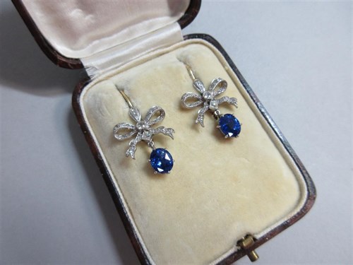Lot 271 - A pair of early 20th century diamond and sapphire pendant earrings