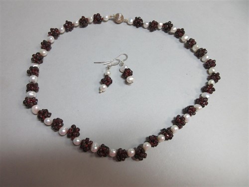 Lot 443 - A garnet bead 'raspberry' and cultured pearl suite