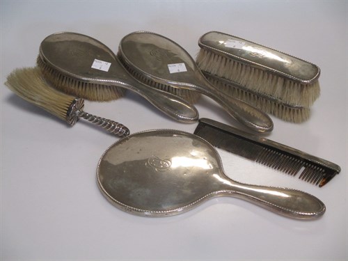 Lot 205 - A six piece silver dressing table set and a...