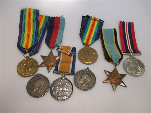 Lot 123 - War medals, with ribbons, a pair of WWI medals,...