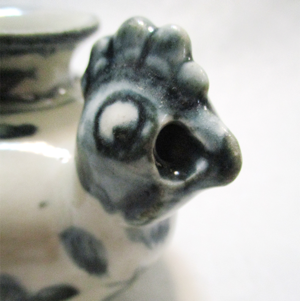 Lot 75 - A provincial Ming chicken head water dropper