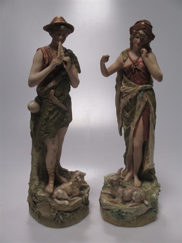 Lot 60 - A pair of Royal Dux figures of a boy and girl,...
