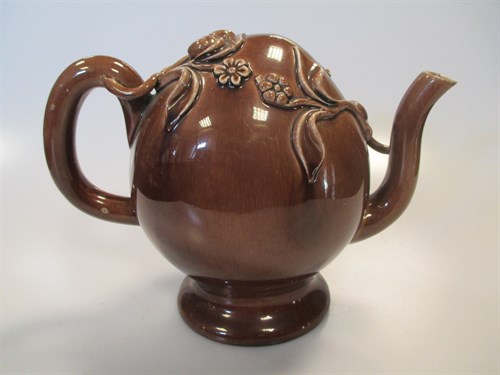 Lot 3 - A Rockingham Cadogan teapot