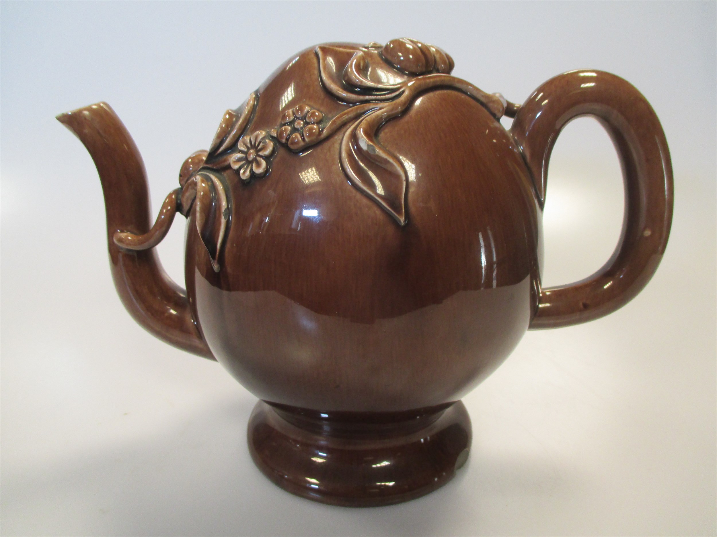 Lot 3 - A Rockingham Cadogan teapot