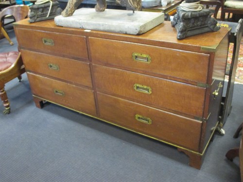 Lot 396 - A mahogany campaign style bank of six drawers...
