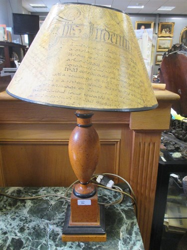 Lot 386 - A pair of wood simulated marble table lamps...