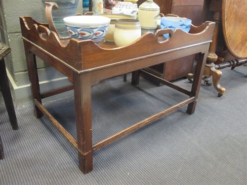 Lot 404 - A George III style tray top table with pierced...