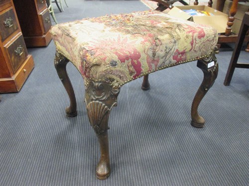 Lot 483 - A George III style upholstered stool on carved...