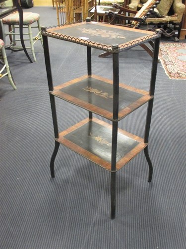 Lot 409 - An early 20th century French inlaid three tier...