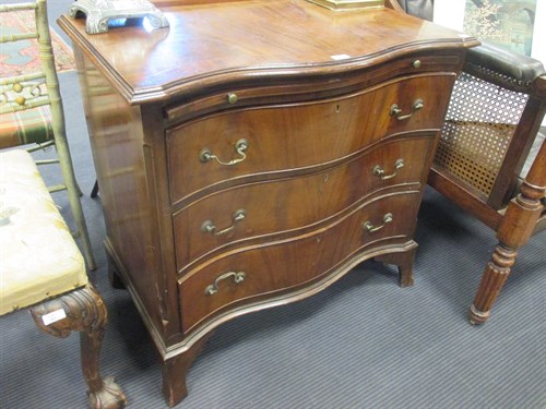 Lot 462 - A George III serpentine chest of drawers, 76 x...