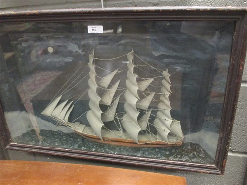 Lot 283 - A three masted schooner diarama in glazed case,...