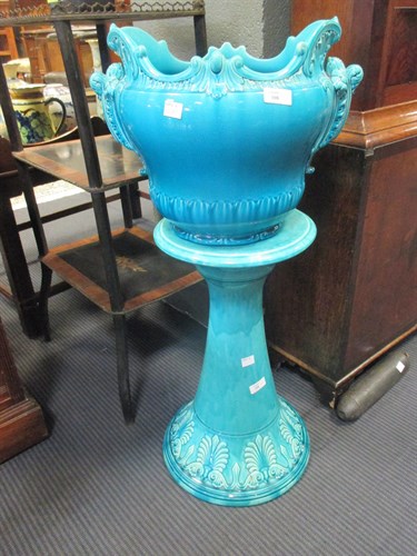 Lot 44 - A Minton majolica turquoise glazed jardiniere...