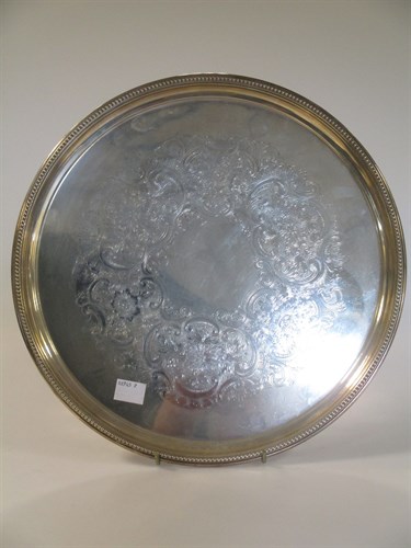 Lot 228 - A circular silver salver, Birmingham 1973,...