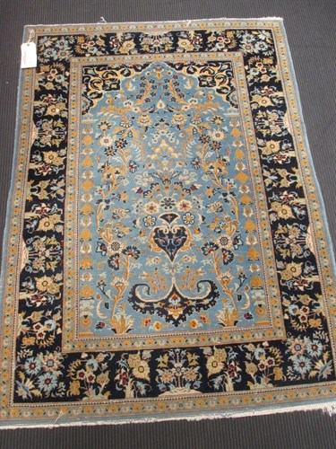 Lot 501 - A small blue ground rug with stylised gulls,...
