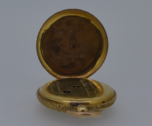 Lot 168 - An unsigned continental open faced pocket watch with accompanying Albertina chain