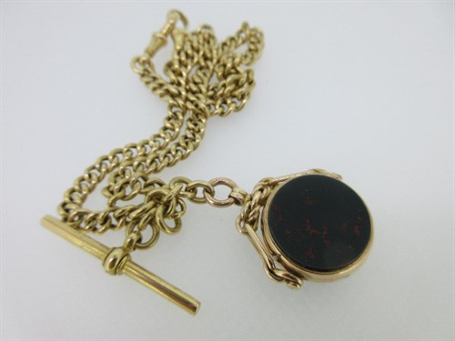 Lot 244 - A necklace length 18ct gold 'Double Albert' watch chain with T-bar suspending a hardstone swivel fob