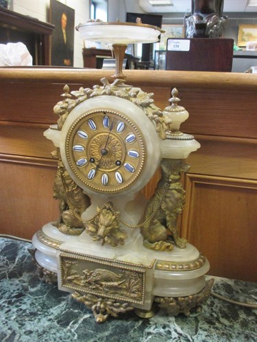 Lot 389 - A Onyx mantel clock of hunting theme with dog...