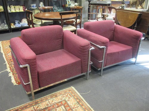 Lot 404 - A pair of bugundy upholstered tubular steel...