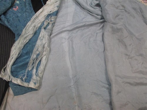 Lot 433 - A Chinese silk robe, in navy blue and light...