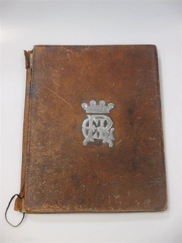 Lot 15 - A silver mounted leather desk blotter, with...
